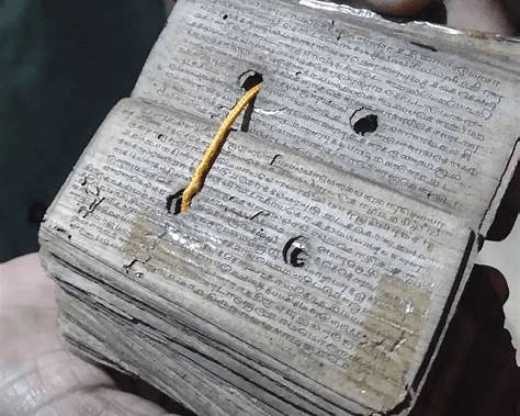 Ancient palm-leaf manuscript from the Nadi reading tradition