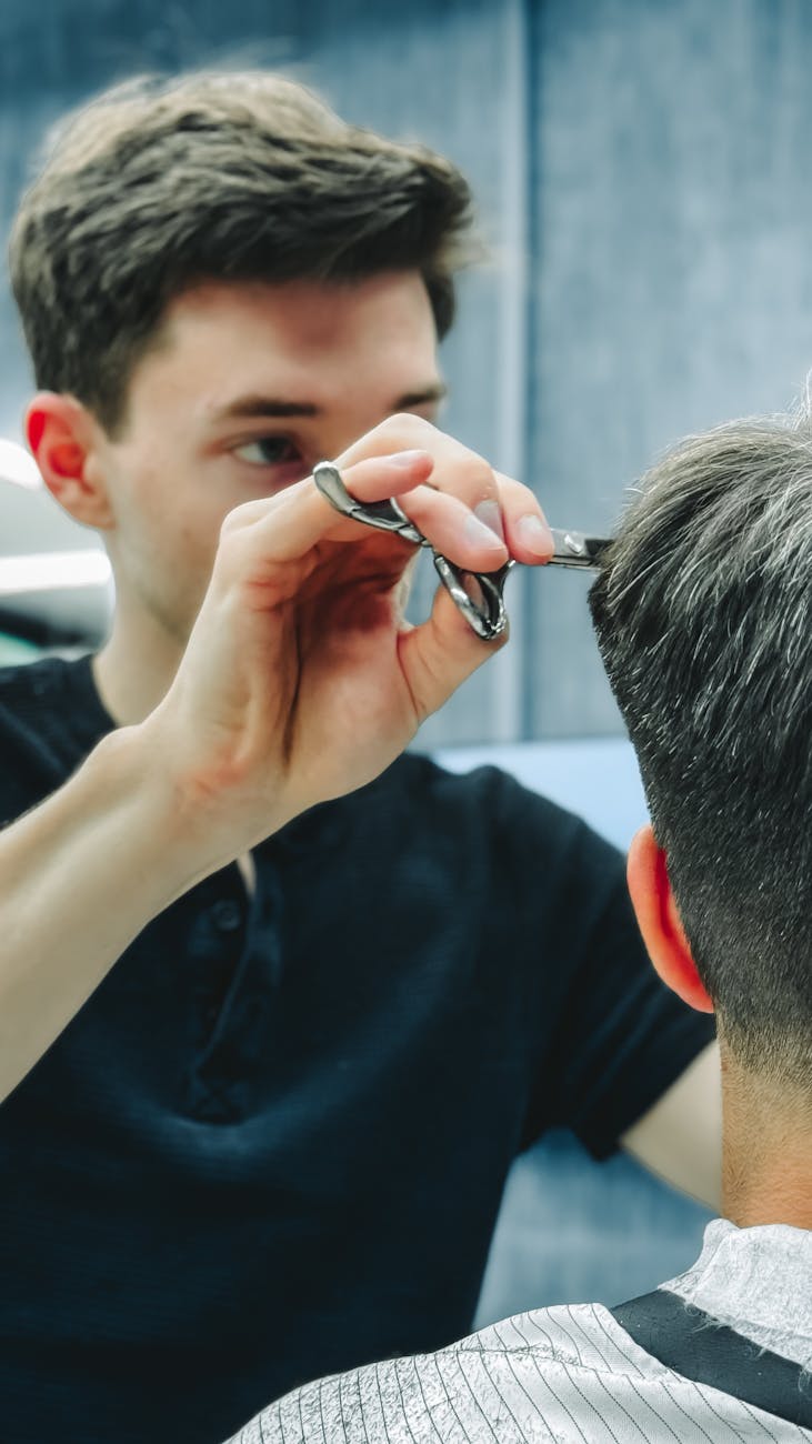 Barber cutting hair