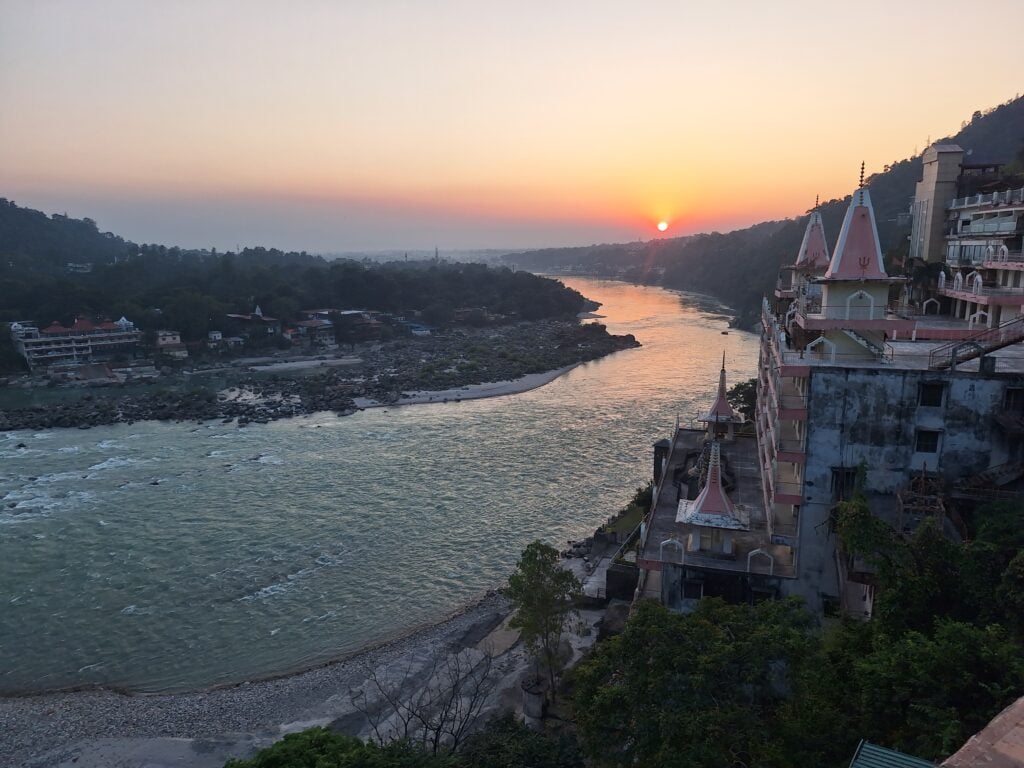 Sunset over the Ganges river and temples in Rishikesh
