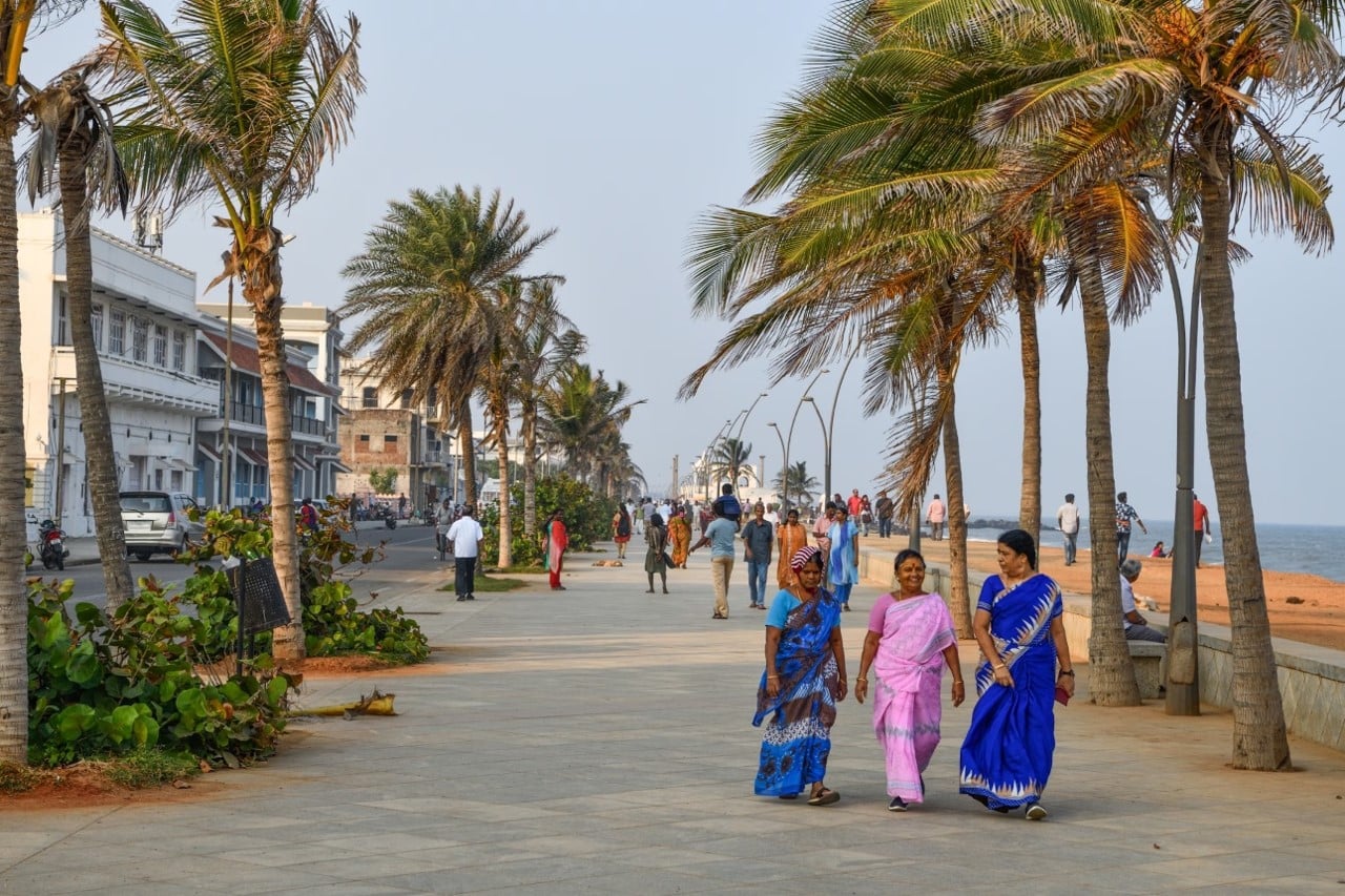 Palm-lined beach promenade beside the Bay of Bengal in Pondicherry