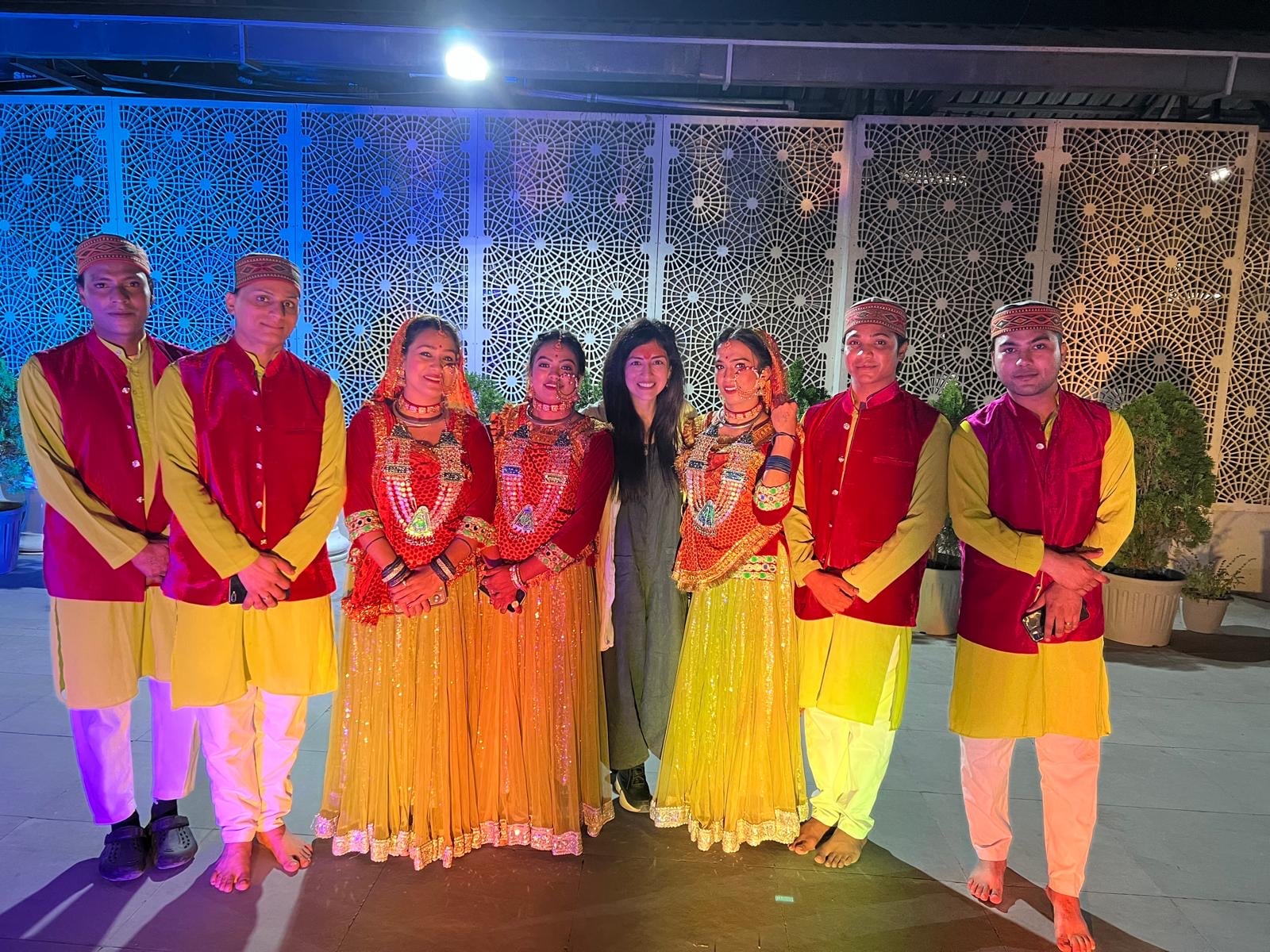 Traditional Indian dancers in colorful costumes performing a cultural dance