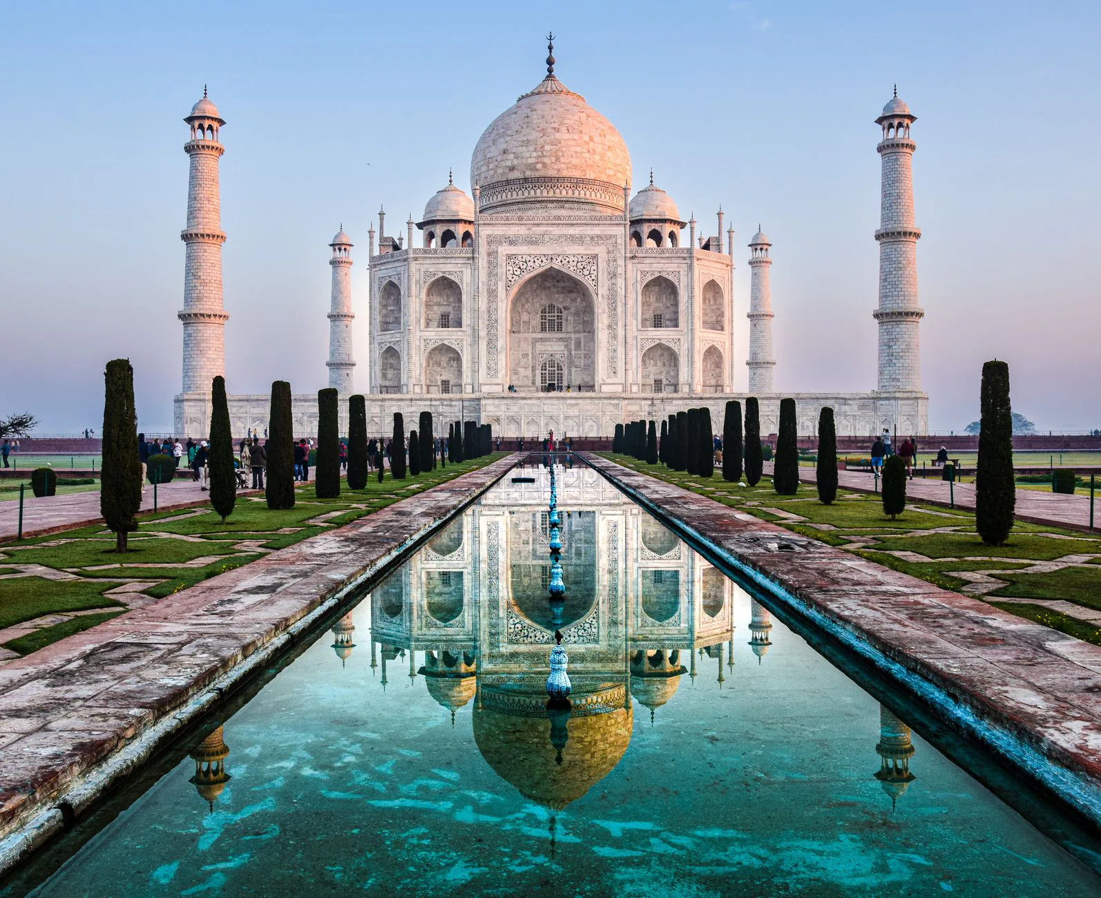 Taj Mahal reflecting in the Yamuna River at sunrise, Agra, India