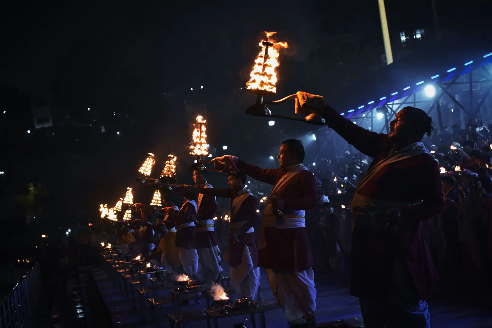 Ganga aarti ceremony at dusk on the ghats of the Ganges river in Rishikesh, India